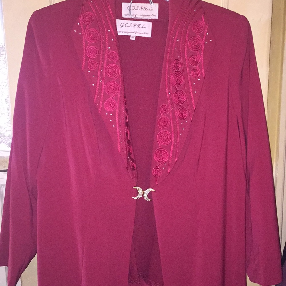 Three piece women’s suit with long coat
